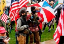 Shacabka Mareykanka oo dhigay dibad bax ay ku dalbanayaan in lagaqaado xayiraada Covid-19(Sawirro)