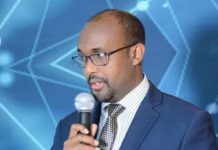 Wasiir layga helay Covid 19″